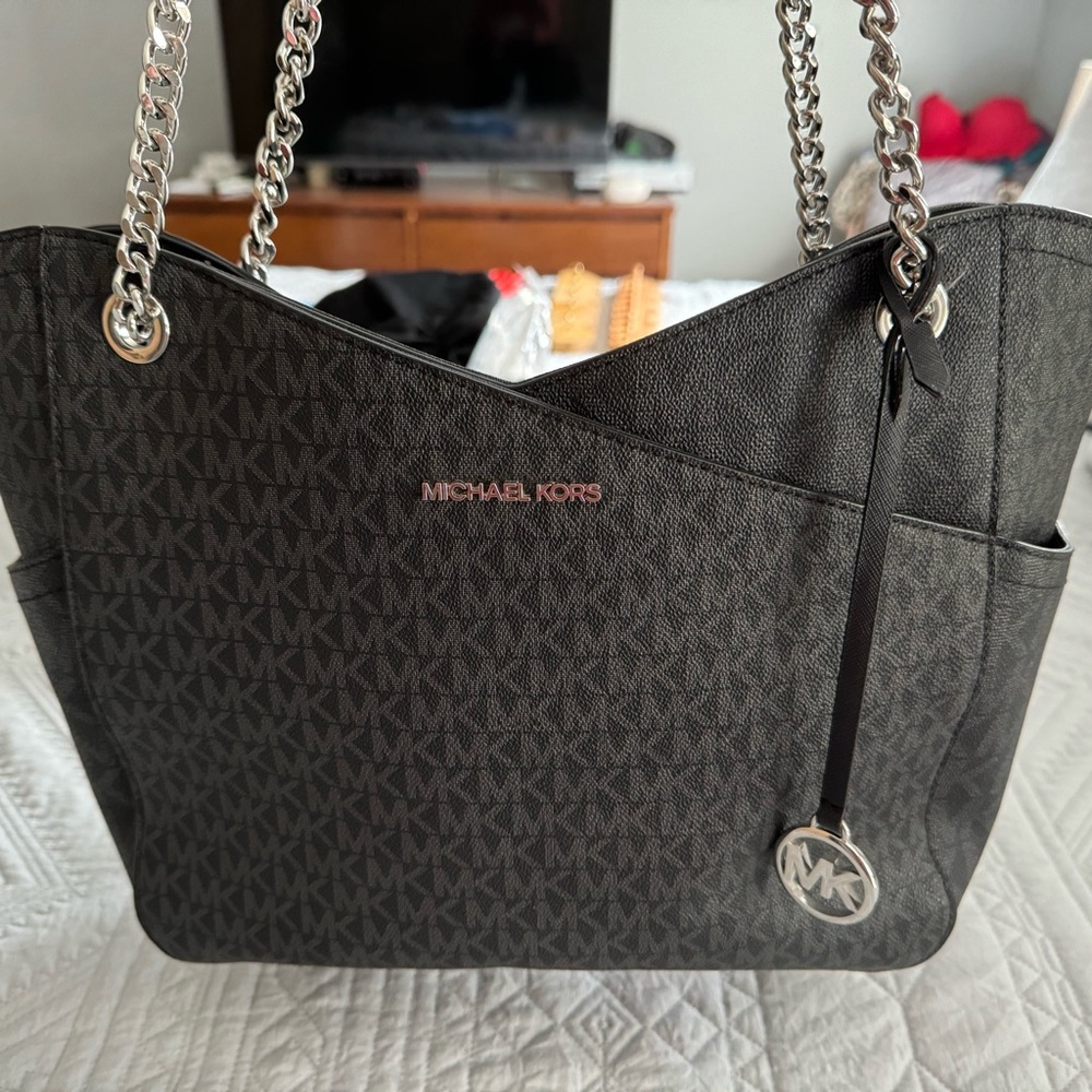 Michael Kor’s hand bag - black with silver on the handle